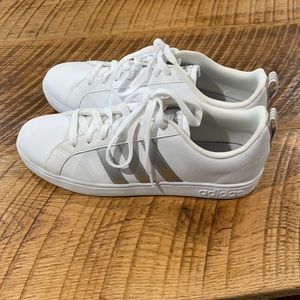 All white adidas shoes in a size 10.